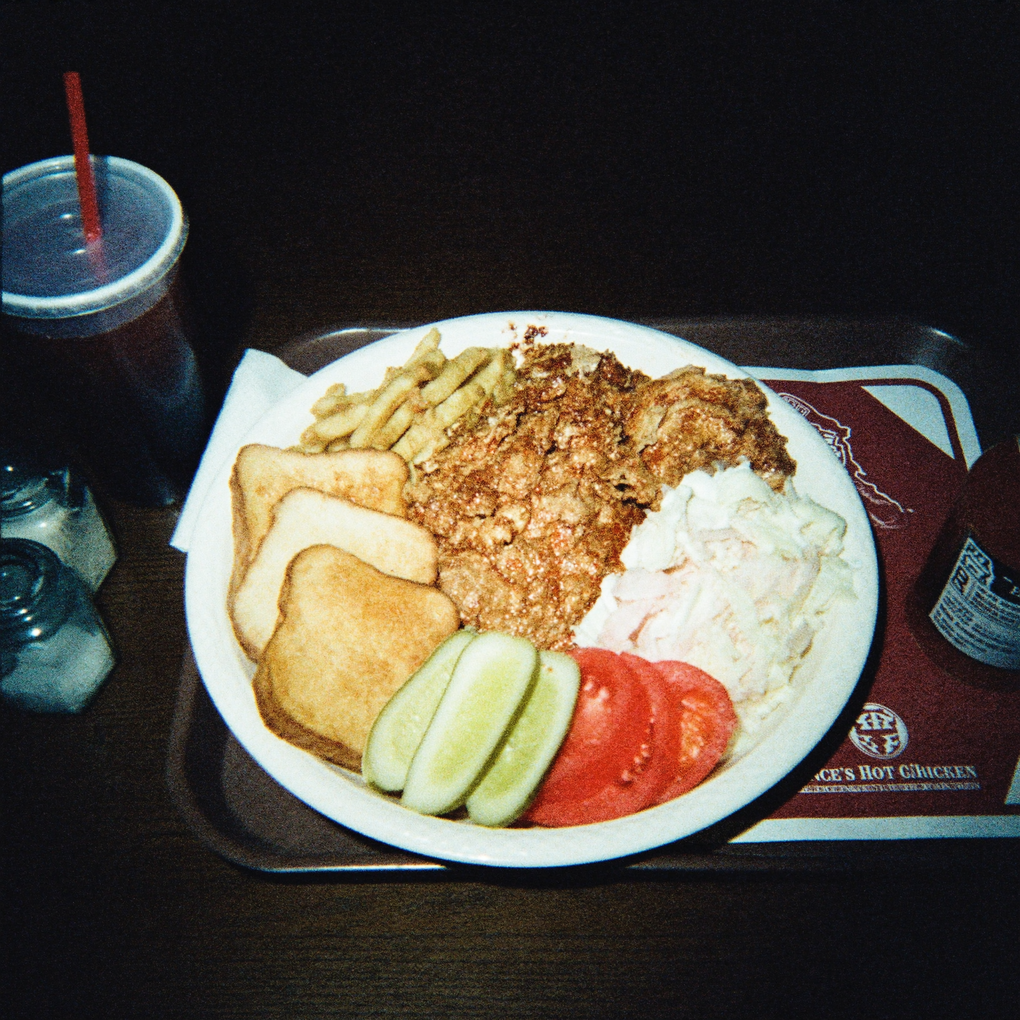 Nashville hot chicken plate, flash-lit