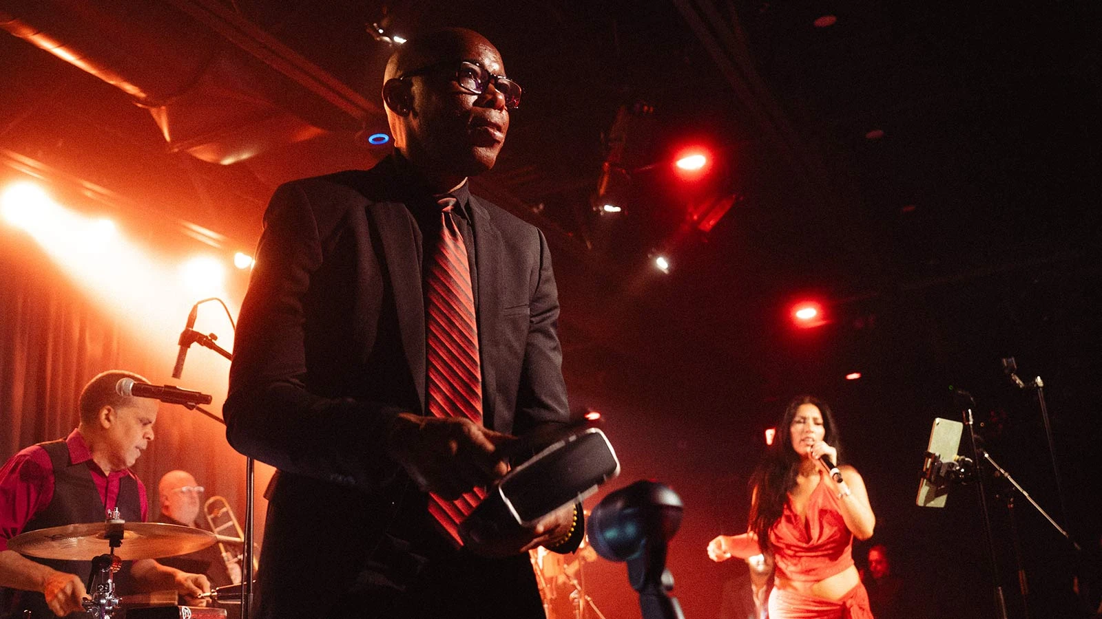 Live performance on stage at Aura Live