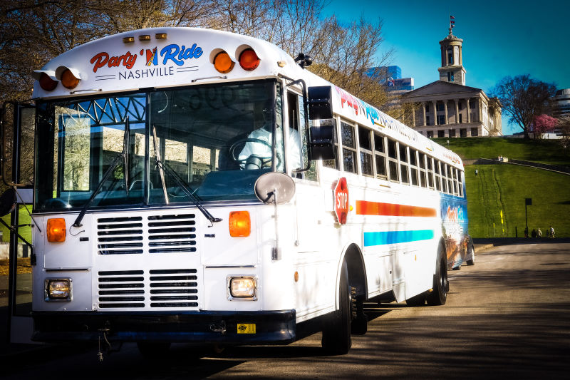 The Party 'N Ride Nashville bus in front of the Tennessee State Capitol